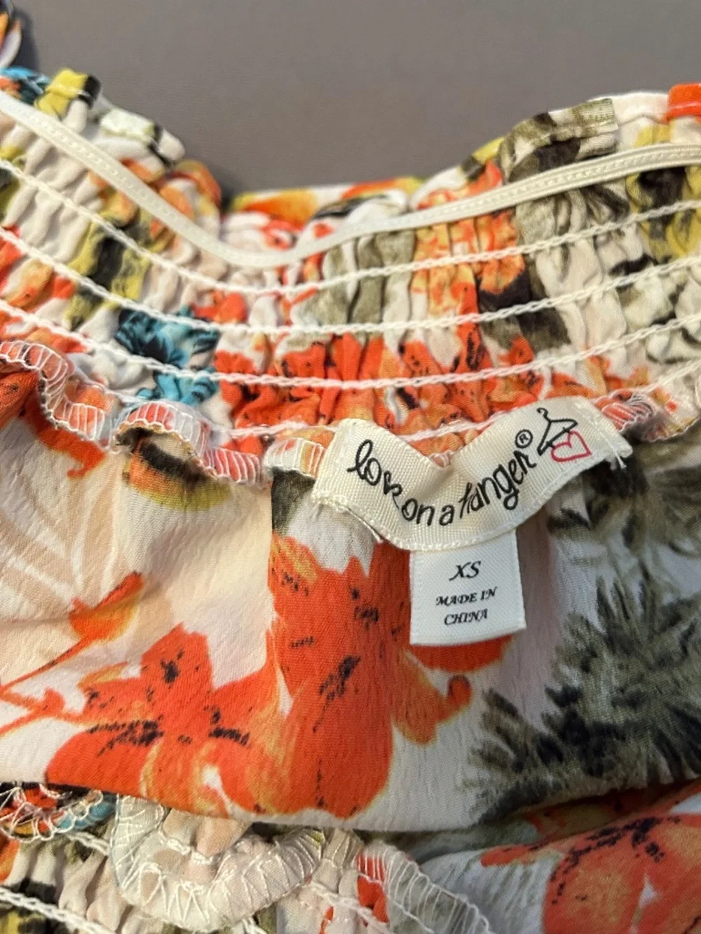 LOVE ON A HANGER floral butterfly crop top blouse, size XS